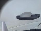 a close up of a door handle on a car