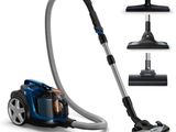 un aspirateur bleu et noir doté de quatre modes d'aspiration différents