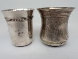pair of silverplated cups with monograms on the sides