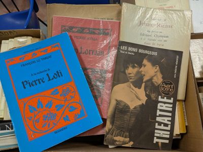 a box full of books that are sitting on top of a table