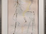 painting of a man riding a horse in a frame on a wall
