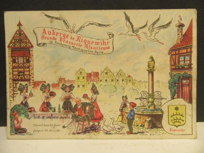 an old postcard with a picture of people in a town