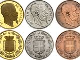 a close up of a bunch of different coins on a white background