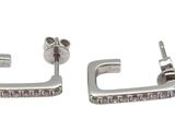 pair of diamond earrings on a white background
