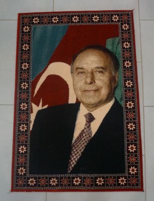 painting of a portrait of a man in a suit and tie