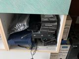 a small cabinet with a bunch of electronics inside of it
