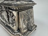 a silver box that is sitting on a table