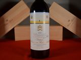 a bottle of wine that is sitting on a table