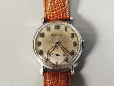 a watch that is sitting on top of a table