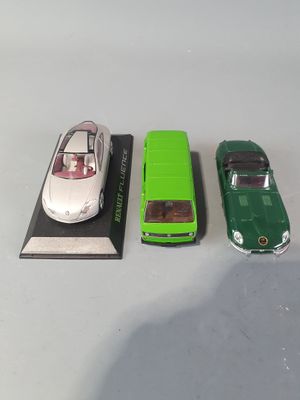 three toy cars that are sitting next to each other