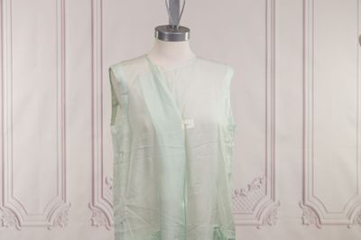 an image of a dress on a mannequin stand