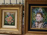 two framed pictures of a woman with a flower in her hair