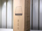 a box that is sitting on a table in front of a wall