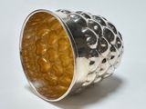 sterling silver and amber cocktail ring with a textured design