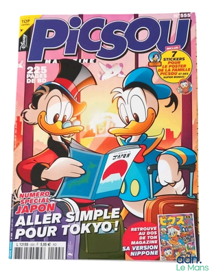 a close up of a magazine with a cartoon character on the cover