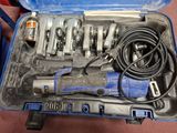 a tool kit in a blue case on the floor