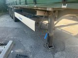 a truck that is parked on the side of the road