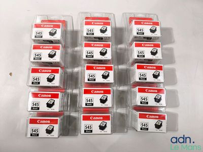 six canon ink cartridges sitting on top of each other on a table