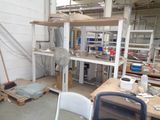 an image of a work area with a table and chairs