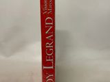 an image of a red book sitting on top of a white table