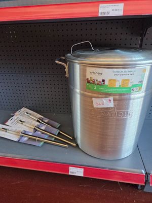 a trash can on the shelf in the store