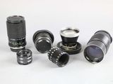 a lot of different types of lenses and lenses on the table