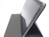 a tablet that is sitting on top of a stand
