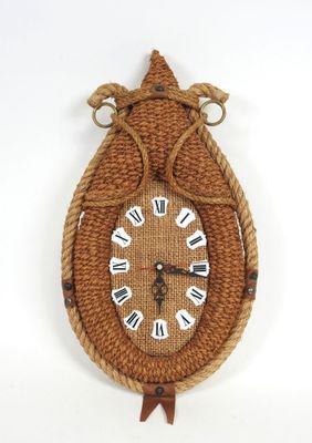 Pendule murale en forme de collier d'attelage en cordage, an…