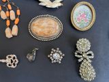 a table with a bunch of jewelry on it