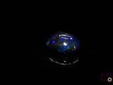 an image of a glass ball in the dark