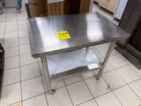 a stainless steel table with a price tag on it