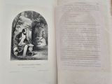 an open book with a picture of a man sitting on a bench