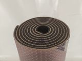 the roll of cloth is wrapped in plastic and ready to be used