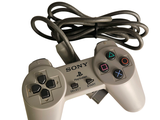 a video game controller that is connected to a charger