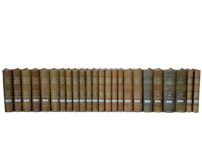 a row of old books sitting on top of each other