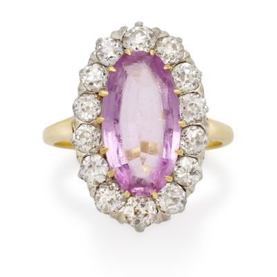 a pink sapphire and diamond cluster ring