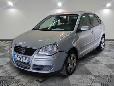 a picture of a silver car parked in a garage