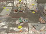 many different types of stamps on the table