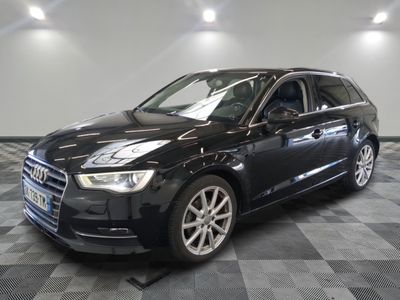 an image of a black audi suv parked in a garage