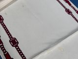 a close up of a piece of cloth with a chain design on it