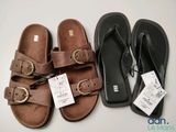three pairs of sandals are lined up next to each other