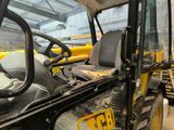 an image of a construction vehicle inside of a building