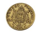 l'image d'une pièce d'or sur laquelle figurent des armoiries
