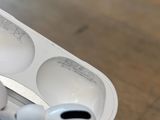a pair of airpods sitting on top of a table