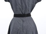 the back of a gray dress with a black belt on a mannequin mannequin mannequin mannequin mannequin mannequin manne
