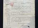 a piece of old paper with a stamp on it
