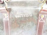 a close up of a bag with a handle on it