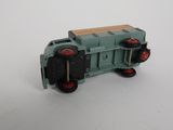 a toy train that is sitting on a white surface
