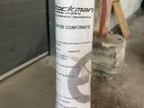 a picture of a pole with a roll of tape attached to it
