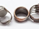 three rings that are sitting next to each other on a white surface
